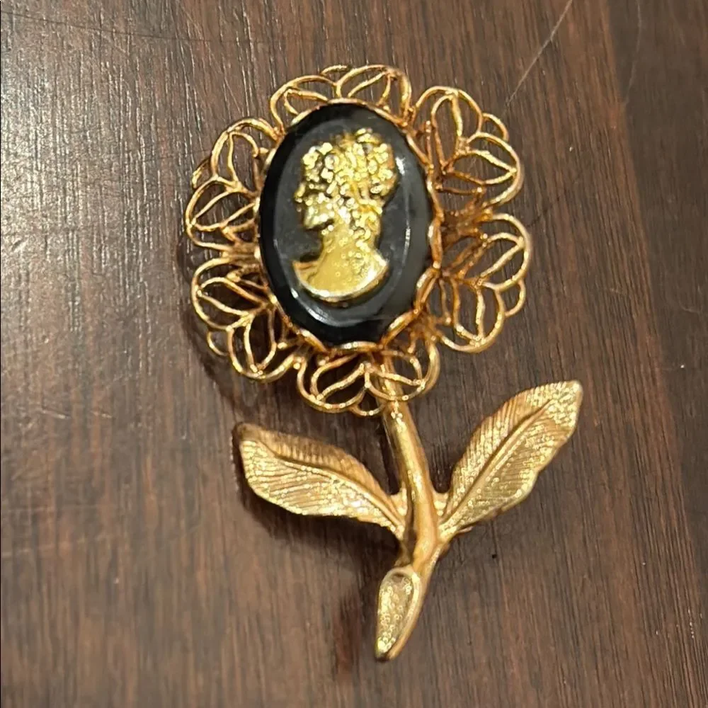 Intricate Gold and Black Flower Cameo Brooch